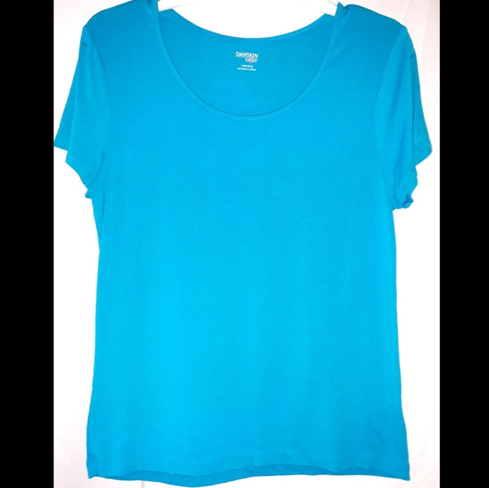 Teal color t-shirt.